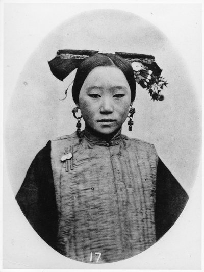 Frontview of Coiffure of a Married Manchu Matron by John Thomson